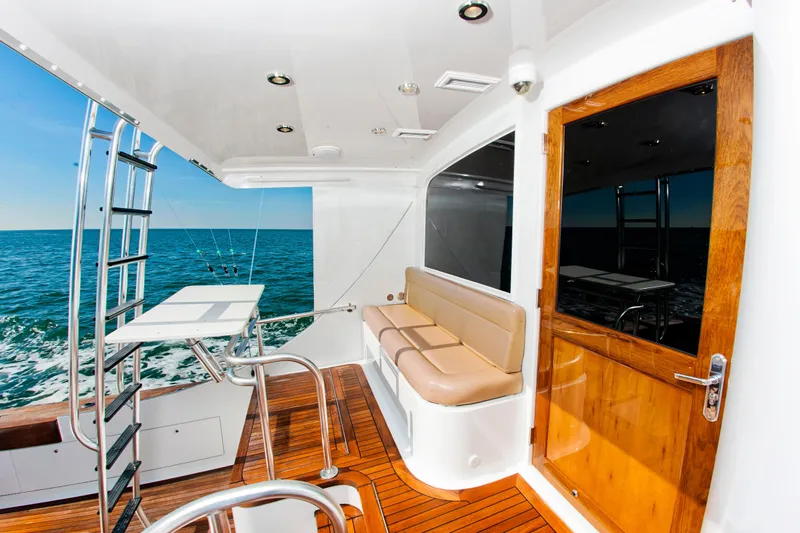  Yacht Photos Pics Luxurious 2000 Buddy Davis 78 yacht interior with ocean view and wooden deck.