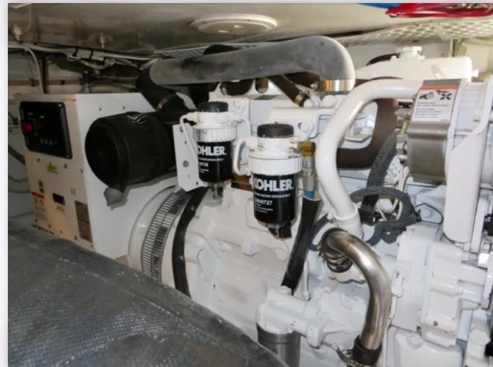  Yacht Photos Pics Engine room of 2000 Buddy Davis 78 yacht with Kohler components.