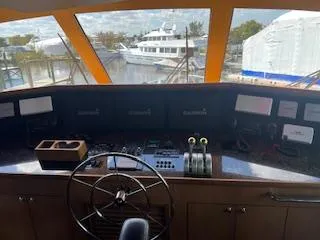  Yacht Photos Pics Helm of 2000 Buddy Davis 78 yacht with Garmin navigation displays.