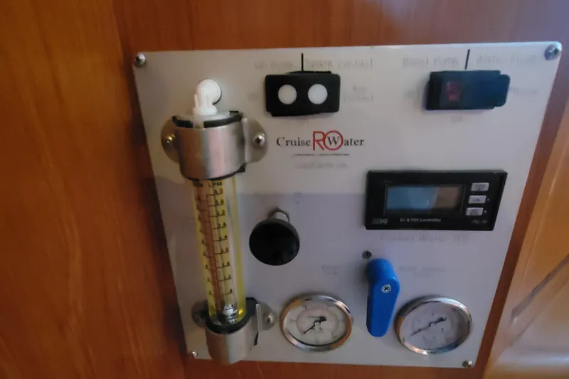 Fellowship Yacht Photos Pics Control panel of a 2001 Grand Alaskan Pilothouse, featuring gauges and switches.
