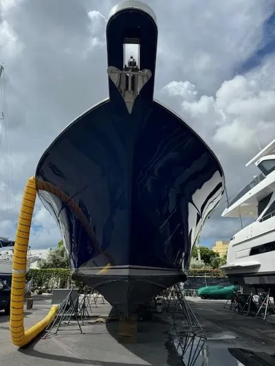 Diggin Donzi Yacht Photos Pics 2007 Donzi 73 Sportfish boat on dry dock, showcasing sleek hull design.