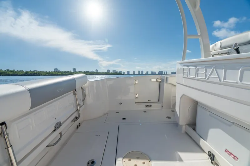 Hi Ho Silver Yacht Photos Pics 2022 Robalo R302 Center Console boat interior with sunny waterfront view.