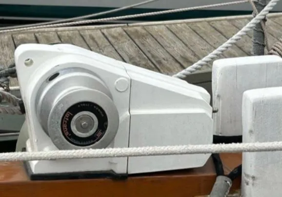 Winch on 1982 Bristol Channel Cutter 28 sailboat, docked with visible ropes and deck.