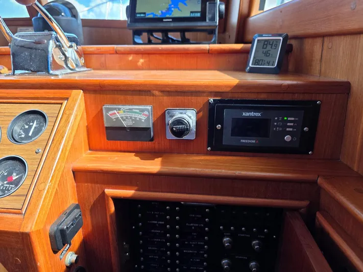 Kokomo Yacht Photos Pics 1993 Grand Banks 42 Classic yacht dashboard with gauges and Xantrex control panel.