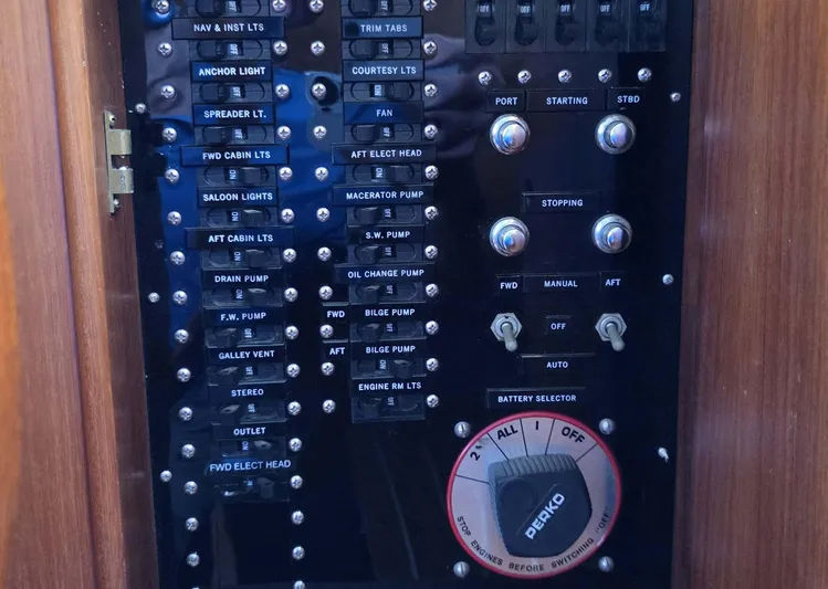 Kokomo Yacht Photos Pics Control panel of a 1993 Grand Banks 42 Classic yacht with various switches and dials.