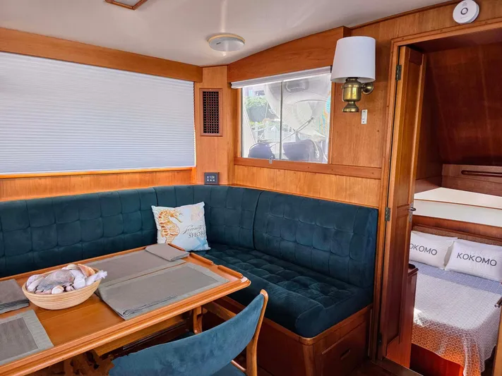 Kokomo Yacht Photos Pics Interior of 1993 Grand Banks 42 Classic yacht with cozy seating and dining area.