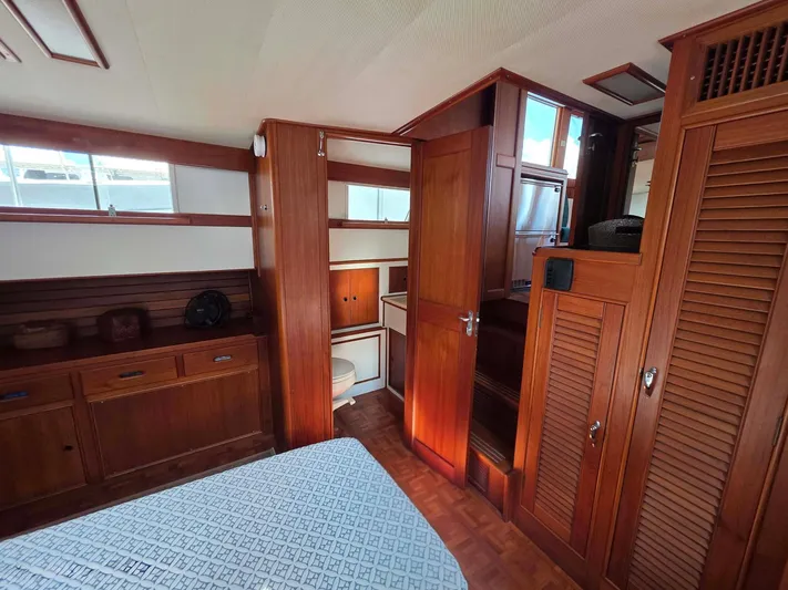 Kokomo Yacht Photos Pics Interior of 1993 Grand Banks 42 Classic yacht with wooden cabinetry and cozy design.