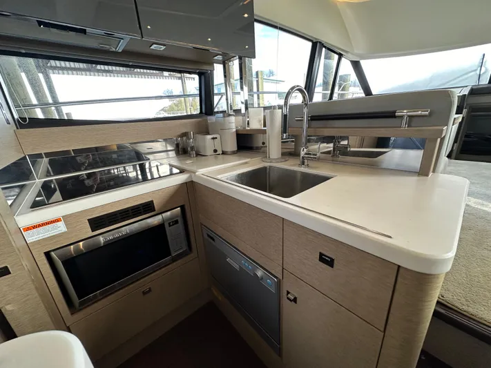  Yacht Photos Pics Modern kitchen in 2017 Prestige 500 yacht with sleek appliances and spacious countertop.