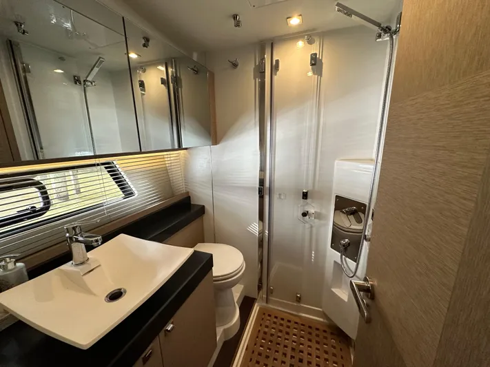  Yacht Photos Pics Luxurious bathroom in 2017 Prestige 500 yacht with modern fixtures and elegant design.