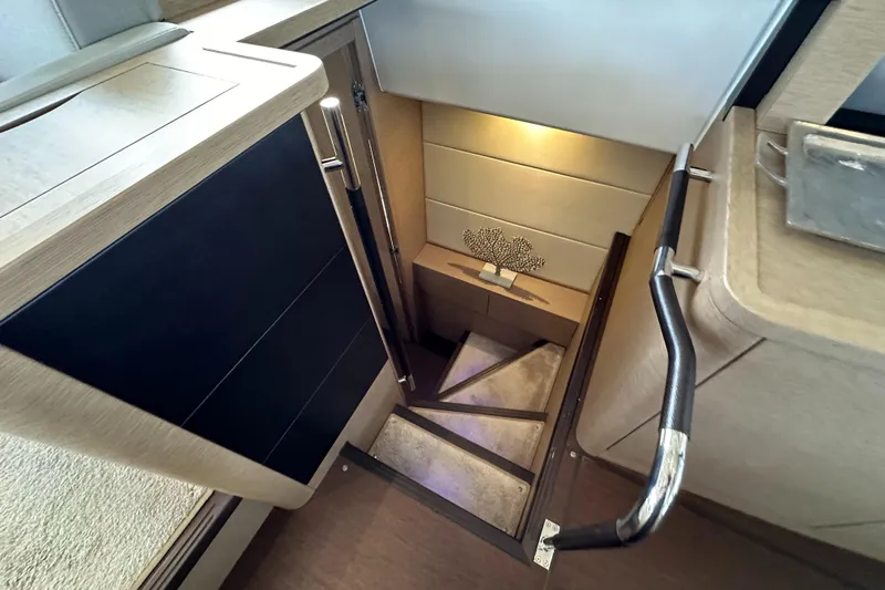  Yacht Photos Pics Staircase in 2017 Prestige 500 yacht interior, featuring modern design and elegant lighting.