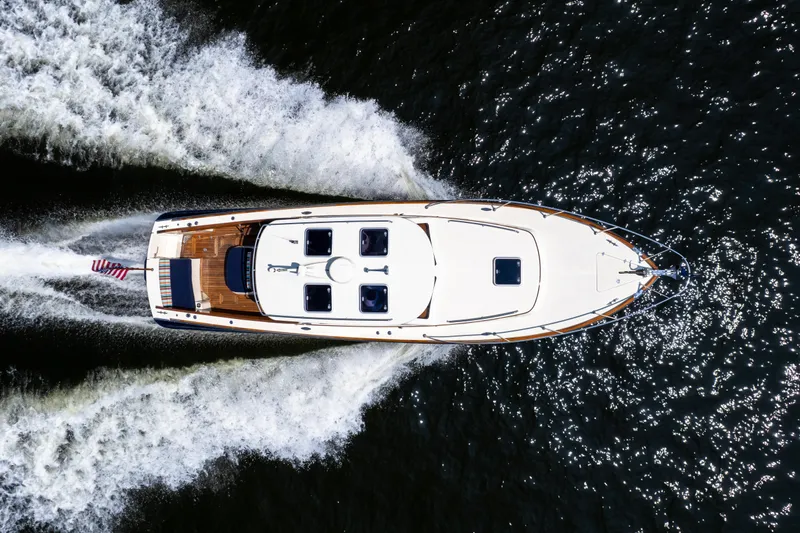 Sometimes Yacht Photos Pics Top view of 2007 Hinckley Picnic Boat EP cruising on water.