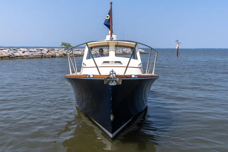 Sometimes Yacht Photos Pics 2007 Hinckley Picnic Boat EP on calm water, front view.