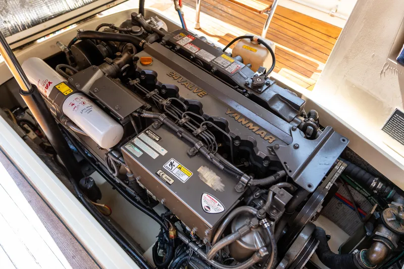 Sometimes Yacht Photos Pics Engine of 2007 Hinckley Picnic Boat EP, featuring Yanmar branding and detailed components.