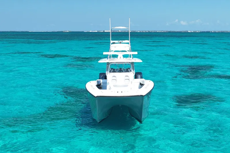  Yacht Photos Pics 2024 Freeman 42 boat on clear turquoise water, front view.