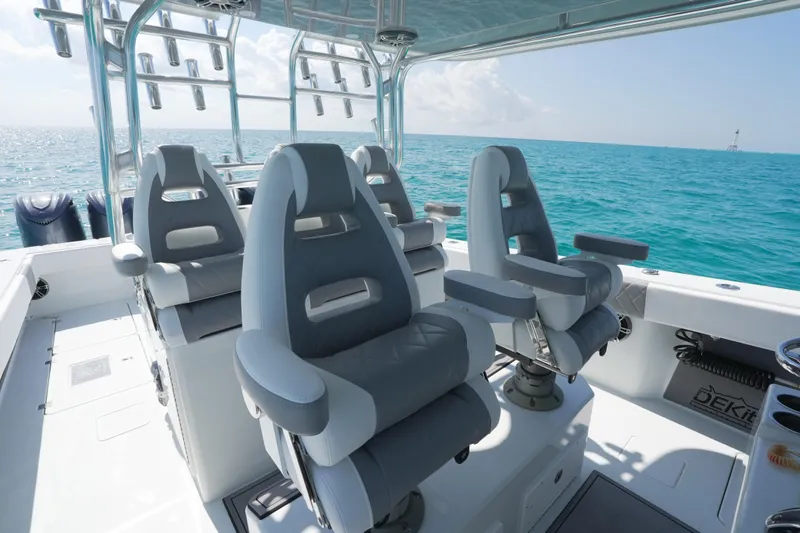  Yacht Photos Pics 2024 Freeman 42 boat interior with luxurious seating, ocean view, and modern design.