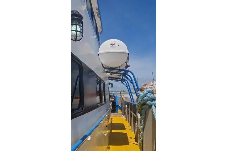  Yacht Photos Pics Custom Built Offshore Crew Vessel, 2004, with lifeboat and blue railings under clear sky.