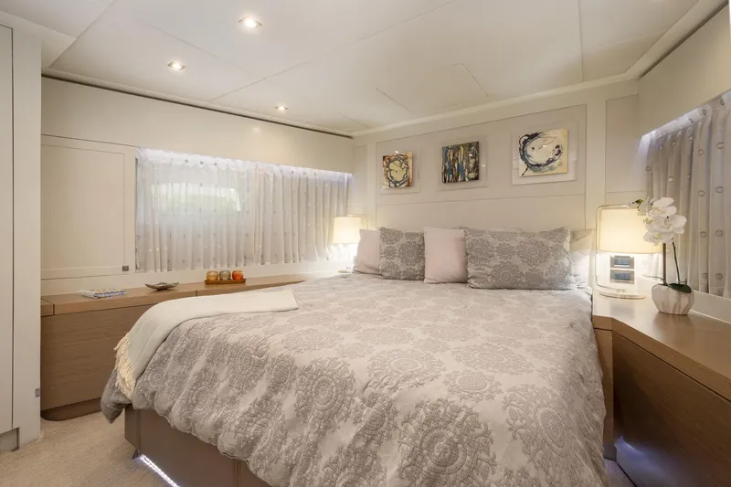 Seaseid Yacht Photos Pics Luxurious bedroom interior on 2016 Hargrave Flybridge Motor Yacht, featuring elegant decor and soft lighting.