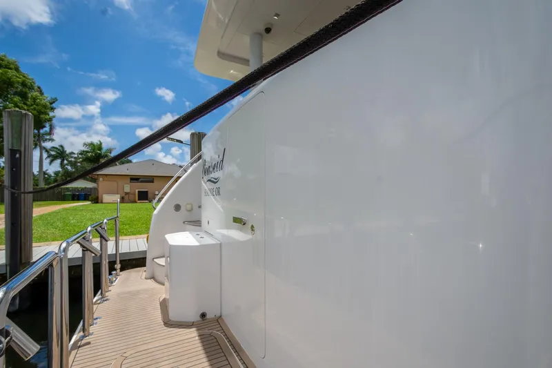 Seaseid Yacht Photos Pics 2016 Hargrave Flybridge Motor Yacht docked under a clear blue sky.