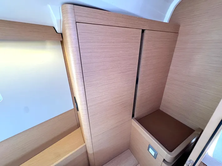 Leopolis Yacht Photos Pics Interior of 2019 Jeanneau Sun Odyssey 440 with wooden paneling.