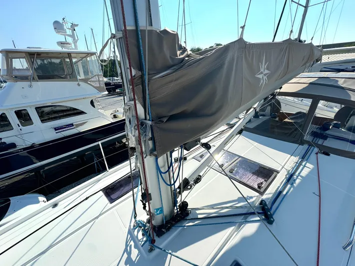 Leopolis Yacht Photos Pics Jeanneau Sun Odyssey 440 sailboat, 2019 model, docked at marina.
