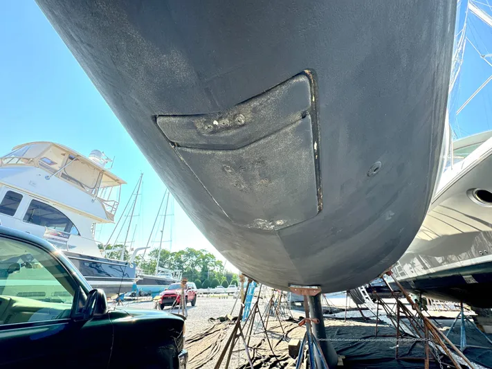 Leopolis Yacht Photos Pics 2019 Jeanneau Sun Odyssey 440 in dry dock, hull view.