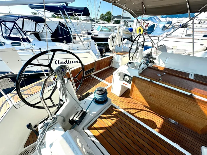 Leopolis Yacht Photos Pics Cockpit of 2019 Jeanneau Sun Odyssey 440 with wooden deck.