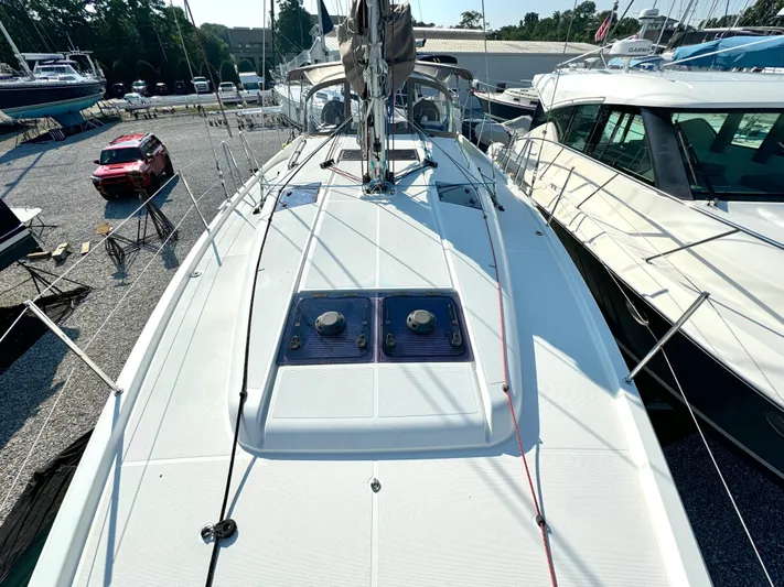 Leopolis Yacht Photos Pics Jeanneau Sun Odyssey 440 sailboat, 2019 model, on a boatyard.
