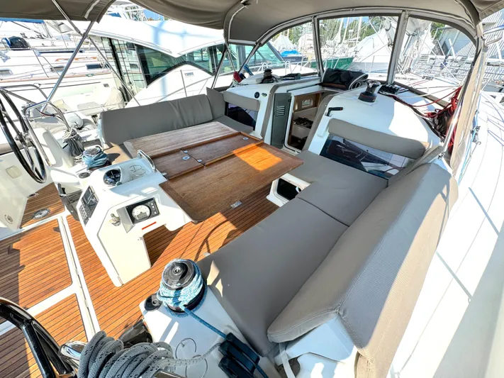 Leopolis Yacht Photos Pics 2019 Jeanneau Sun Odyssey 440 Performance yacht cockpit with seating and navigation equipment.