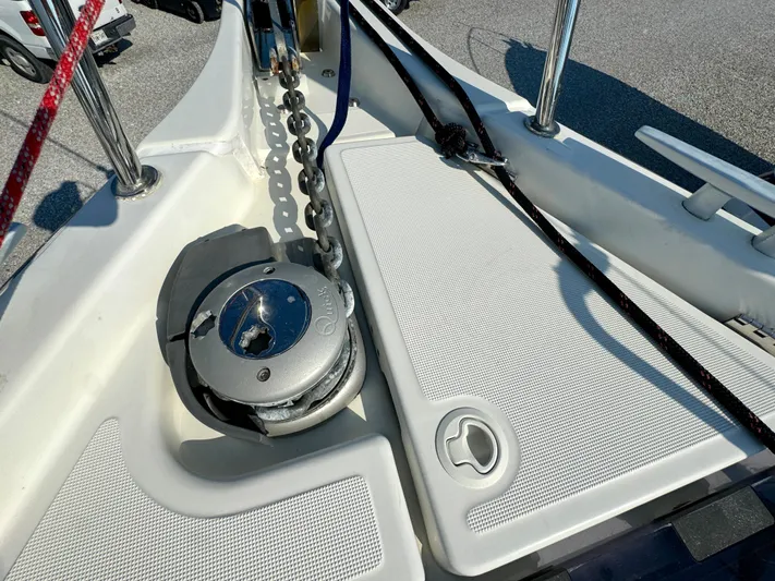 Leopolis Yacht Photos Pics Deck of 2019 Jeanneau Sun Odyssey 440 Performance with anchor chain and winch.