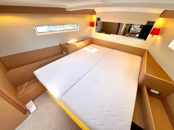 Leopolis Yacht Photos Pics Luxurious cabin interior of 2019 Jeanneau Sun Odyssey 440 Performance yacht.