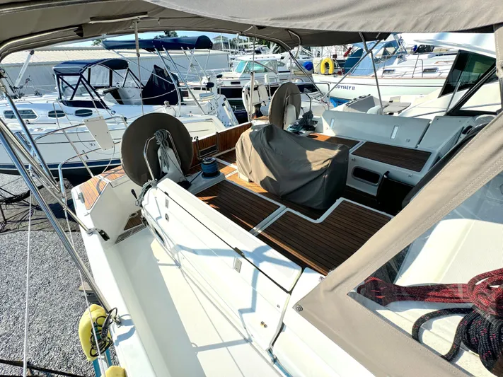 Leopolis Yacht Photos Pics 2019 Jeanneau Sun Odyssey 440 Performance sailboat docked, featuring spacious deck and modern design.