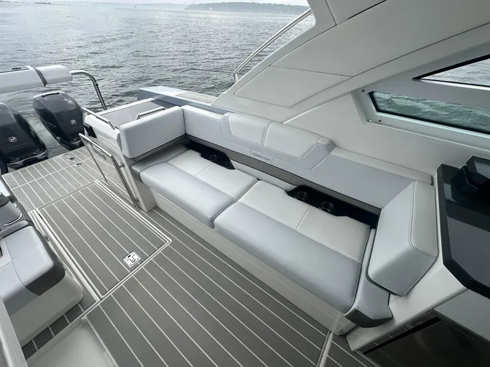  Yacht Photos Pics 2021 Formula 400 Super Sport Crossover boat interior with sleek seating and modern design.