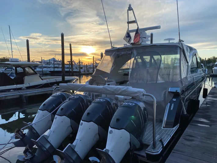 Yacht Photos Pics 2021 Formula 400 Super Sport Crossover boat docked at sunset.