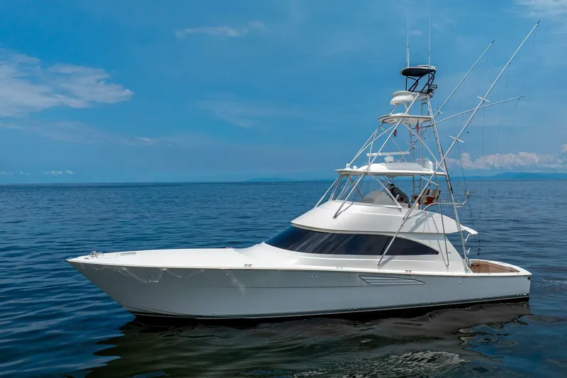 Galati Yacht Sales Trade Yacht Photos Pics 2021 Viking 58 Convertible yacht on calm ocean under clear blue sky.