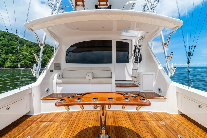 Galati Yacht Sales Trade Yacht Photos Pics Luxurious 2021 Viking 58 Convertible yacht interior with teak deck and seating area.