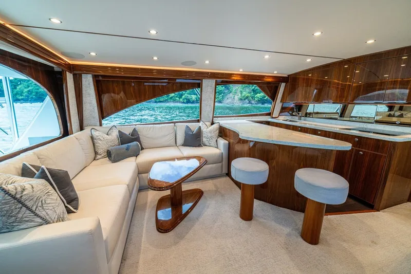 Galati Yacht Sales Trade Yacht Photos Pics Luxurious interior of 2021 Viking 58 Convertible yacht with elegant seating and modern design.