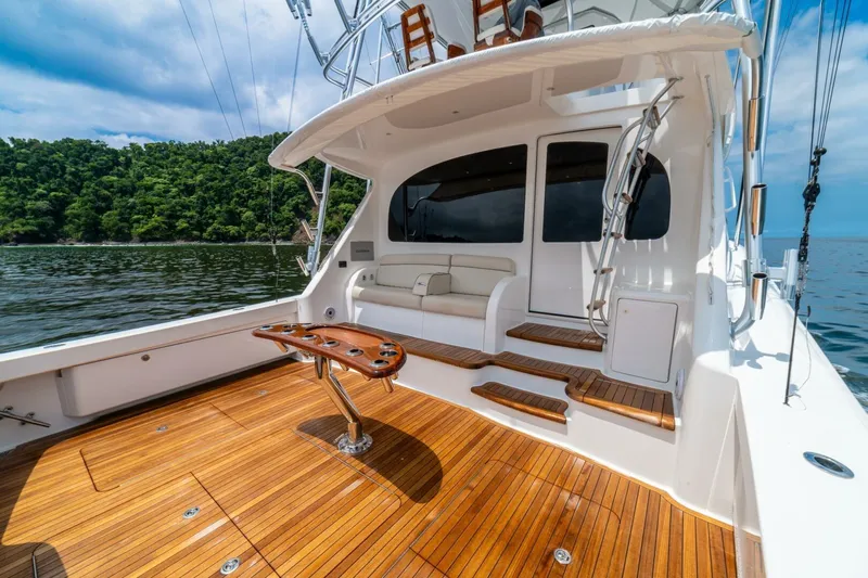 Galati Yacht Sales Trade Yacht Photos Pics Luxurious 2021 Viking 58 Convertible yacht with teak deck and scenic ocean view.
