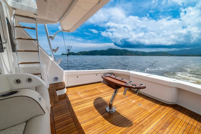 Galati Yacht Sales Trade Yacht Photos Pics Luxurious 2021 Viking 58 Convertible yacht deck with scenic ocean view.