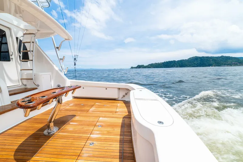 Galati Yacht Sales Trade Yacht Photos Pics 2021 Viking 58 Convertible yacht deck with ocean view and island in the distance.