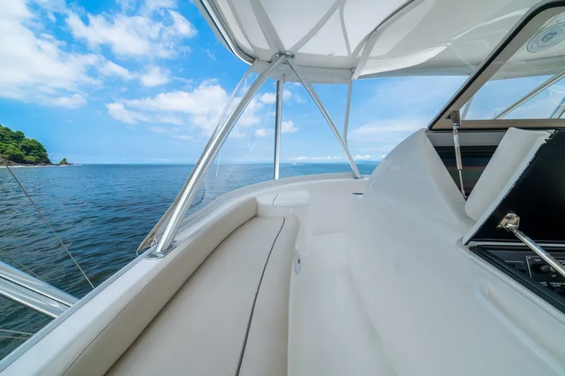 Galati Yacht Sales Trade Yacht Photos Pics 2021 Viking 58 Convertible yacht interior with ocean view and clear blue sky.