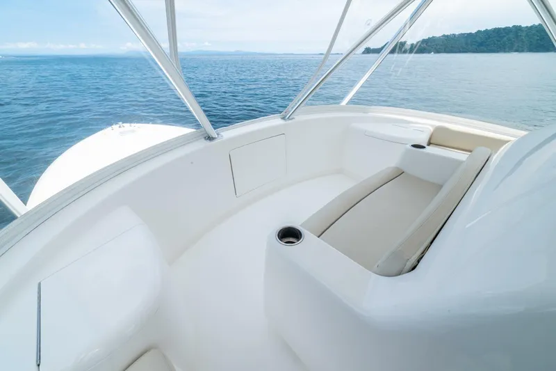 Galati Yacht Sales Trade Yacht Photos Pics 2021 Viking 58 Convertible yacht interior with ocean view, featuring sleek seating and modern design.