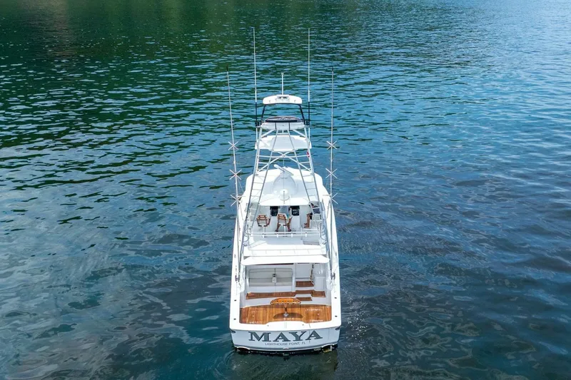 Galati Yacht Sales Trade Yacht Photos Pics Aerial view of 2021 Viking 58 Convertible yacht on calm water.