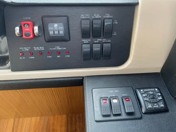 Kings' Ransom Yacht Photos Pics Control panel of a 2017 Sea Ray L590 Fly yacht with various switches and indicators.