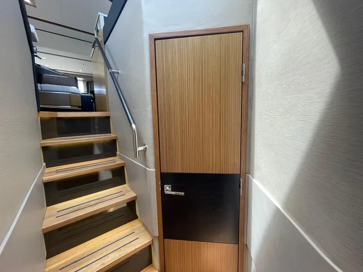 Kings' Ransom Yacht Photos Pics Staircase and door inside 2017 Sea Ray L590 Fly yacht interior.