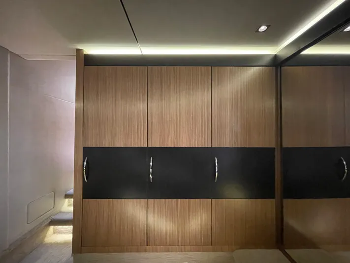 Kings' Ransom Yacht Photos Pics Luxurious interior of 2017 Sea Ray L590 Fly yacht with sleek wooden cabinetry.