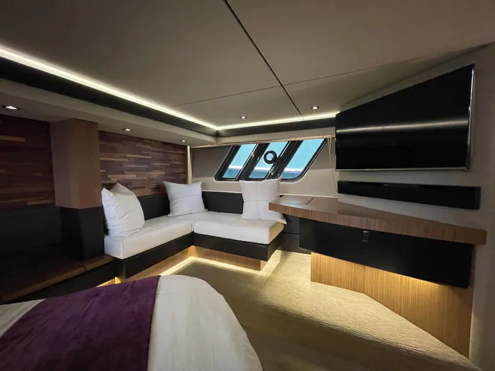 Kings' Ransom Yacht Photos Pics Luxurious interior of 2017 Sea Ray L590 Fly yacht with modern seating and ambient lighting.