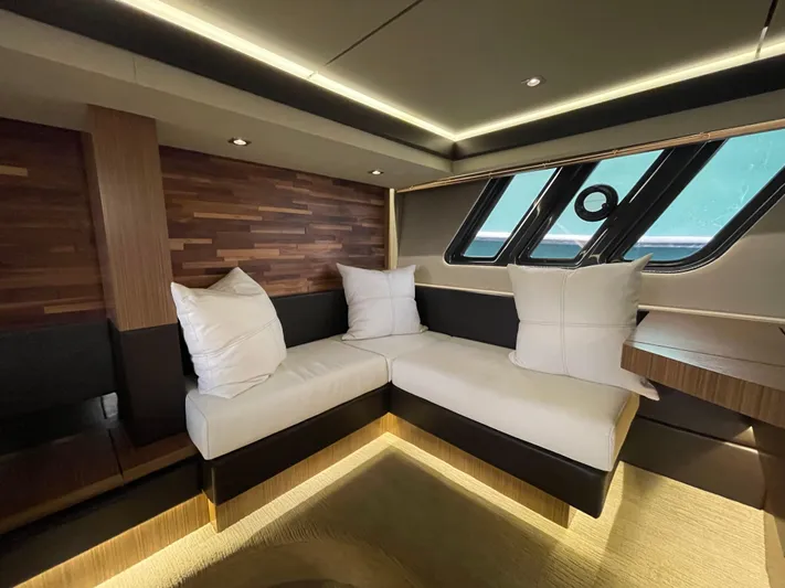 Kings' Ransom Yacht Photos Pics Luxurious interior of 2017 Sea Ray L590 Fly yacht with modern seating and ambient lighting.