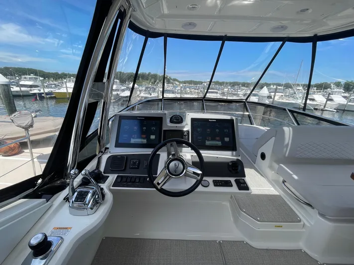 Kings' Ransom Yacht Photos Pics Helm of 2017 Sea Ray L590 Fly yacht with modern navigation displays and controls.