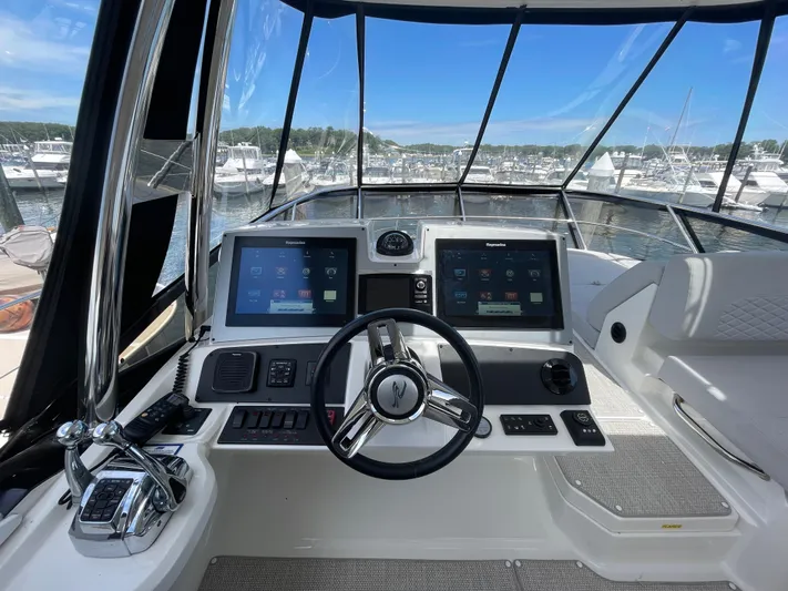 Kings' Ransom Yacht Photos Pics Helm of 2017 Sea Ray L590 Fly yacht with dual displays and steering wheel.