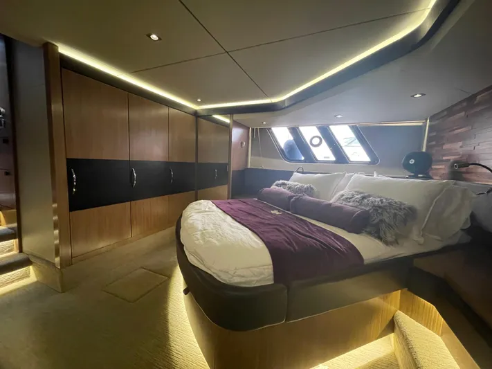 Kings' Ransom Yacht Photos Pics Luxurious 2017 Sea Ray L590 Fly yacht bedroom with modern design and ambient lighting.